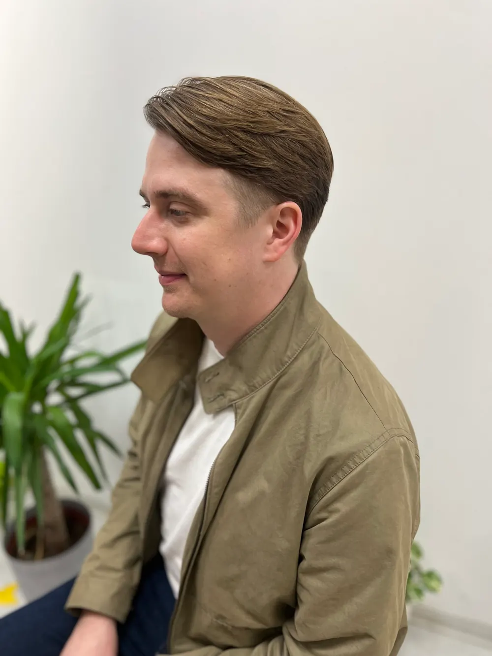 Men’s medium-length side-parted haircut