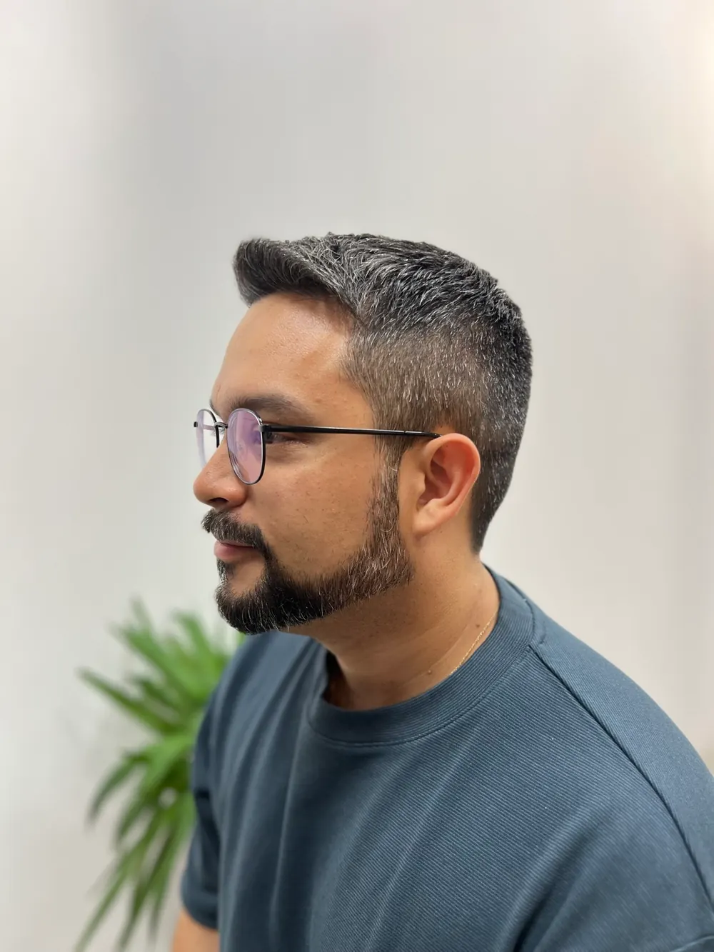 Men’s short haircut with a beard